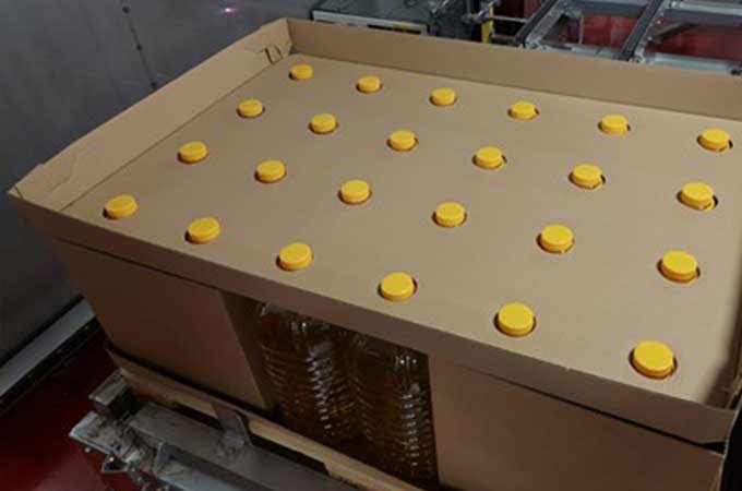 Safely transporting 10L bottles of cooking oil with less material, less costs, and reduced carbon.
